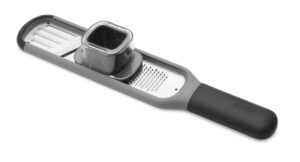 Stainless steel garlic and ginger grater by Joseph Joseph with sharp double-action teeth
