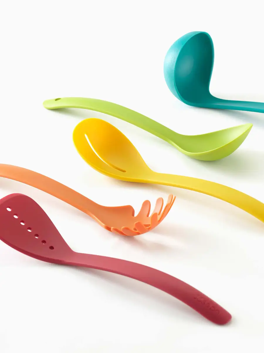 Joseph Joseph Nest™ Utensils with rainbow-colored slotted spoon, ladle, spatula, and solid spoon