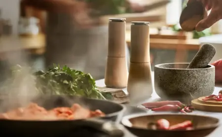 Best kitchen gadgets to save time and reduce mess – Spindola salad spinner in use