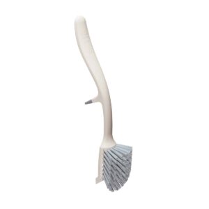 Space-saving dish brush with sink-edge rest by Joseph Joseph in Grey-Blue color